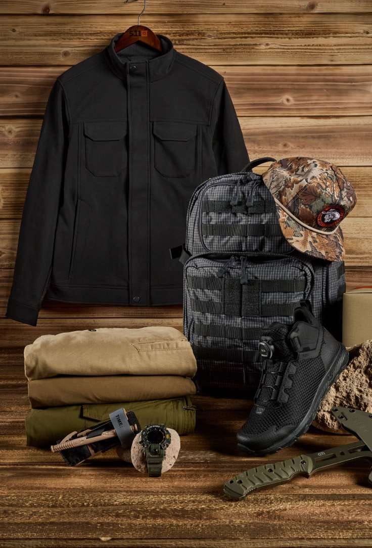 Adventure gear and apparel on a wood background