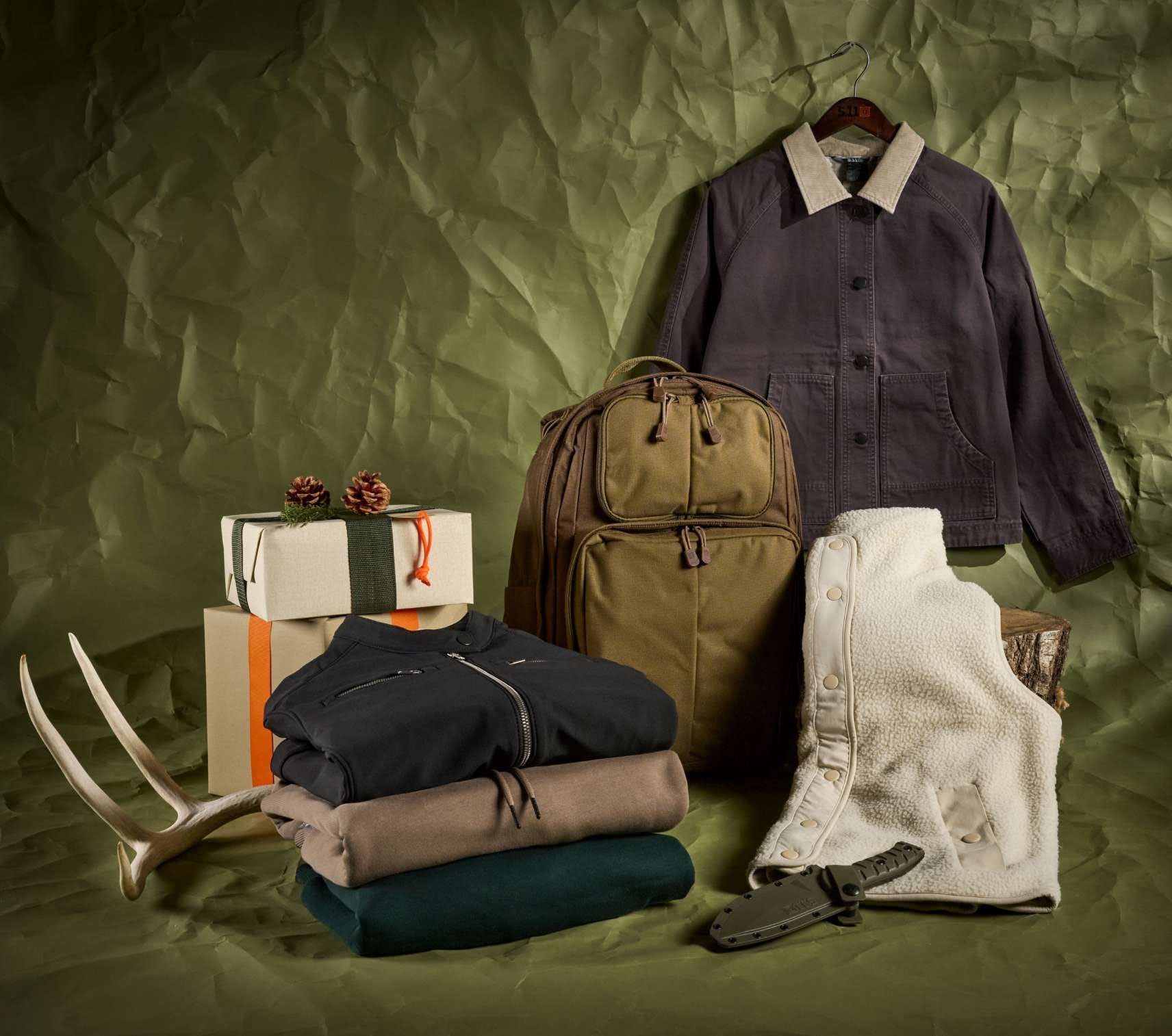 Collection of Women's Apparel on a green background