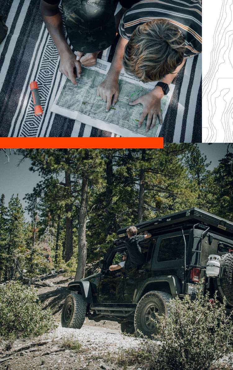 Two boys look at a map | A father and son drive down a dusty path in an off-road vehicle