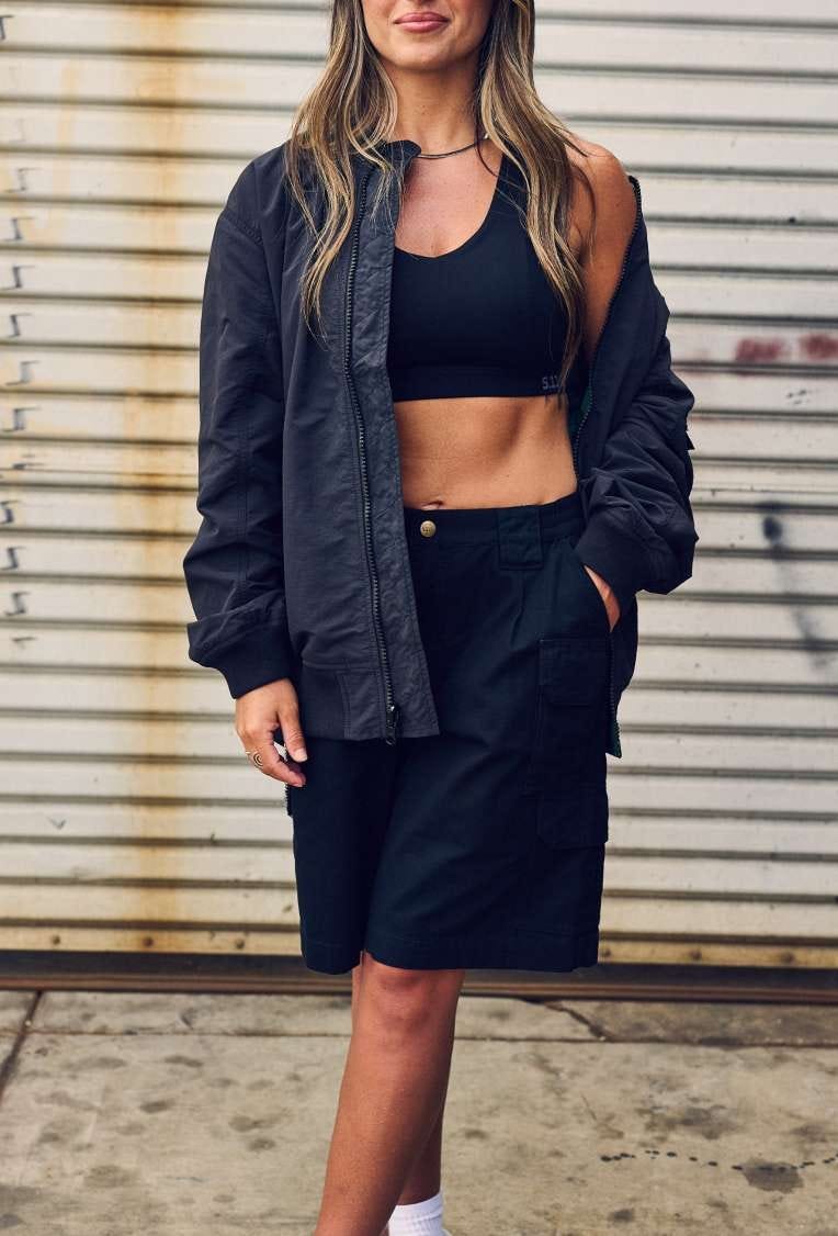 Woman walking wearing shorts