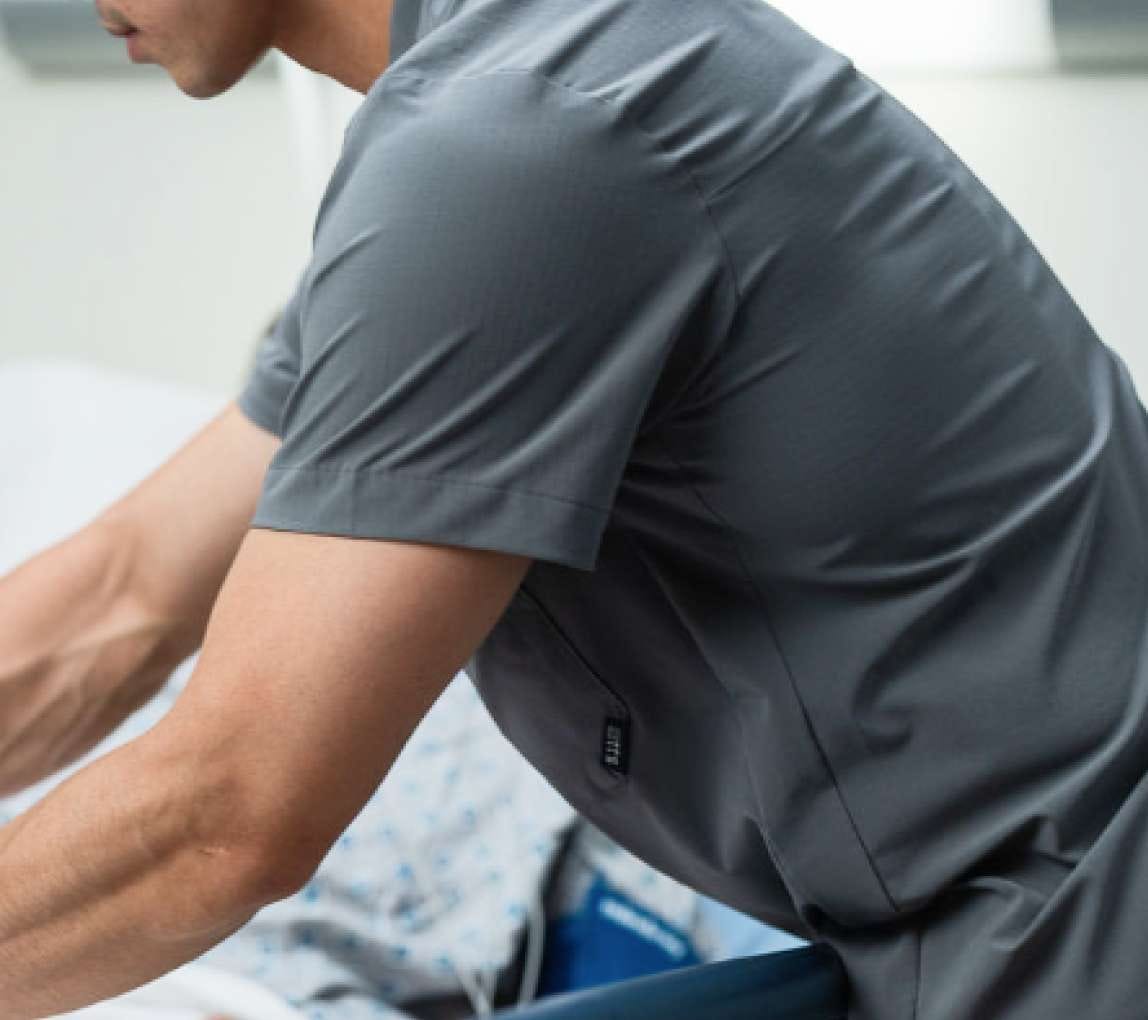 Closeup of underarm in scrub shirt