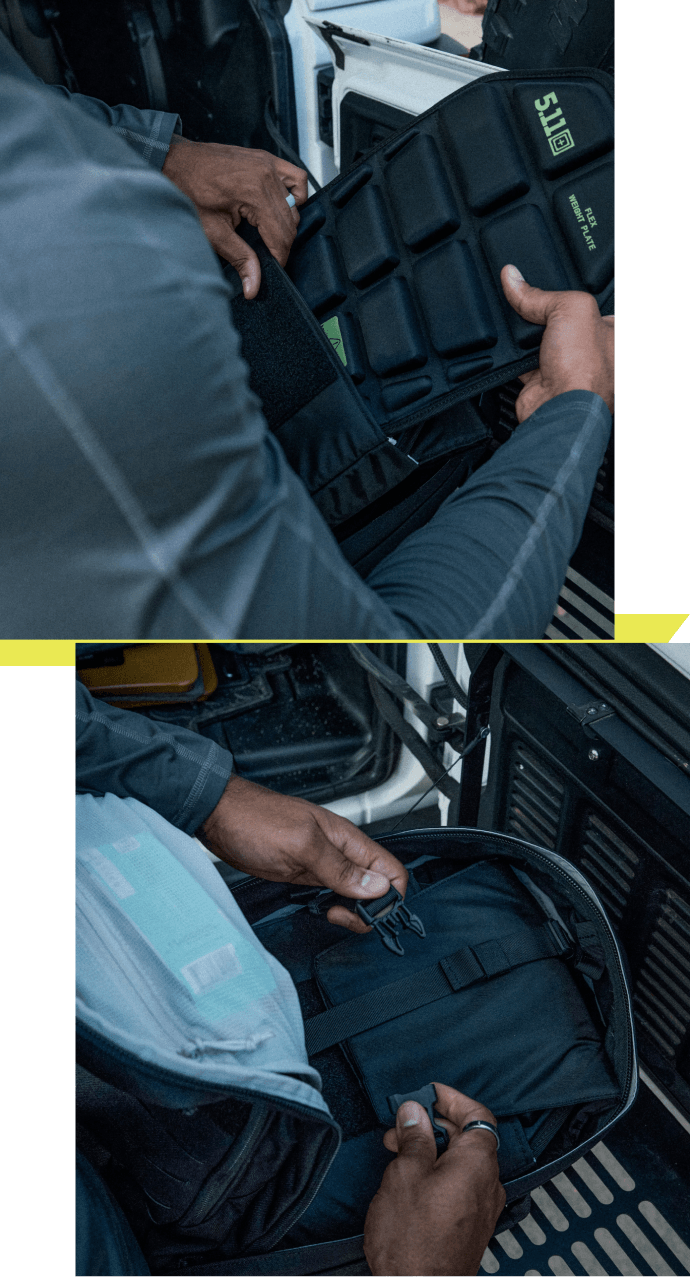 Man loads a weight plate into his Taconic Ruck Pack