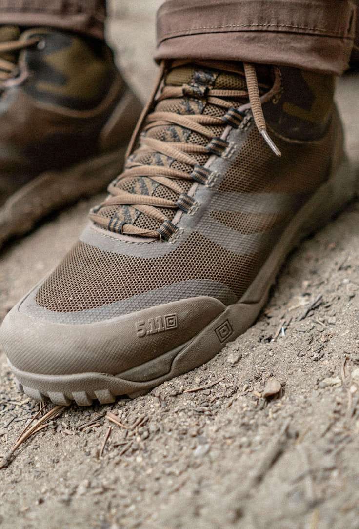 Close up of a 5.11 boot on a rock