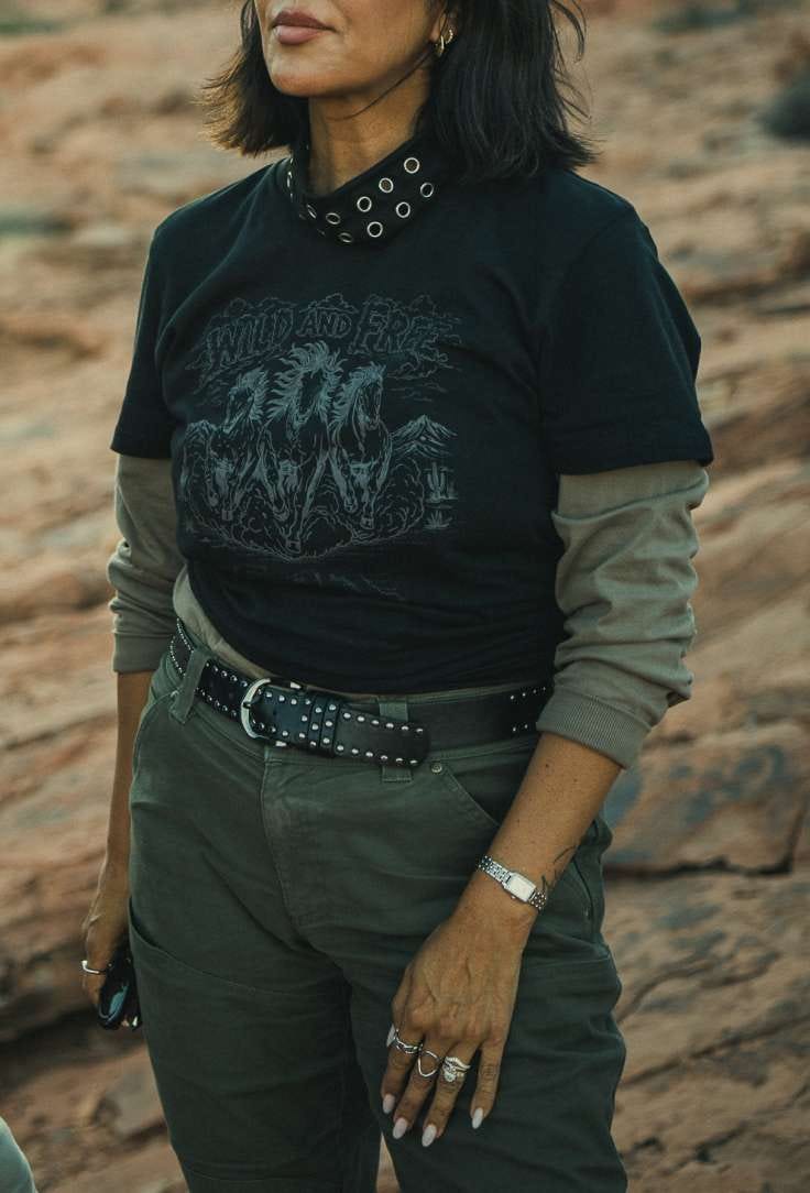 Woman with rocky background