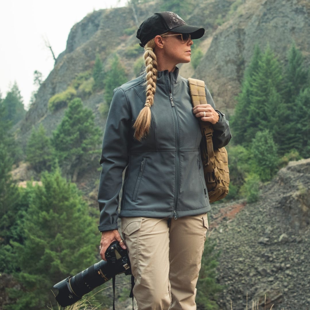 Women uses tactical equipment for hiking, camping